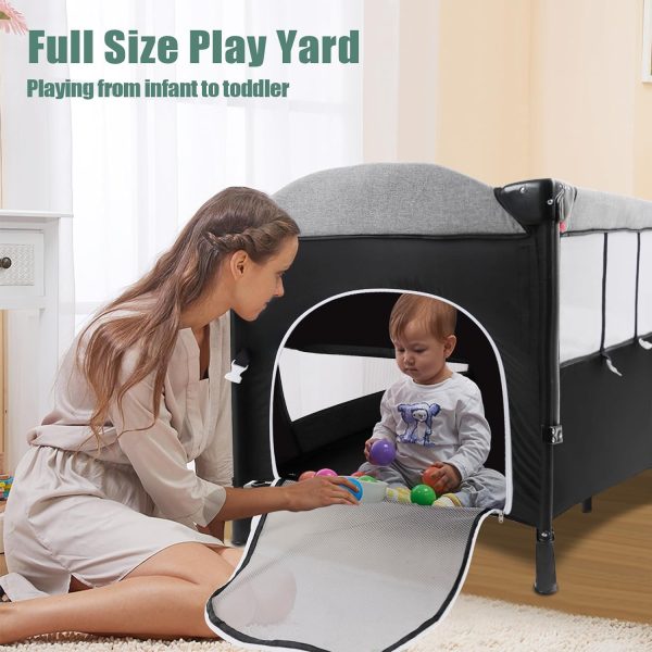 MMBABY 5-in-1 Pack and Play Portable Crib for Baby,Multifunction Bedside Crib from Newborn to Toddlers,U-Shaped Diaper Changer,Playard,Safety Strap,Carry Bag,Hanging Toys (Black)