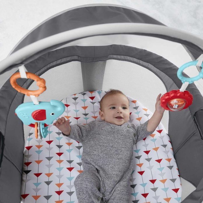 fisher price baby portable bassinet and play space on the go baby dome with 2 toys and canopy puppy perfection amazon ex 4