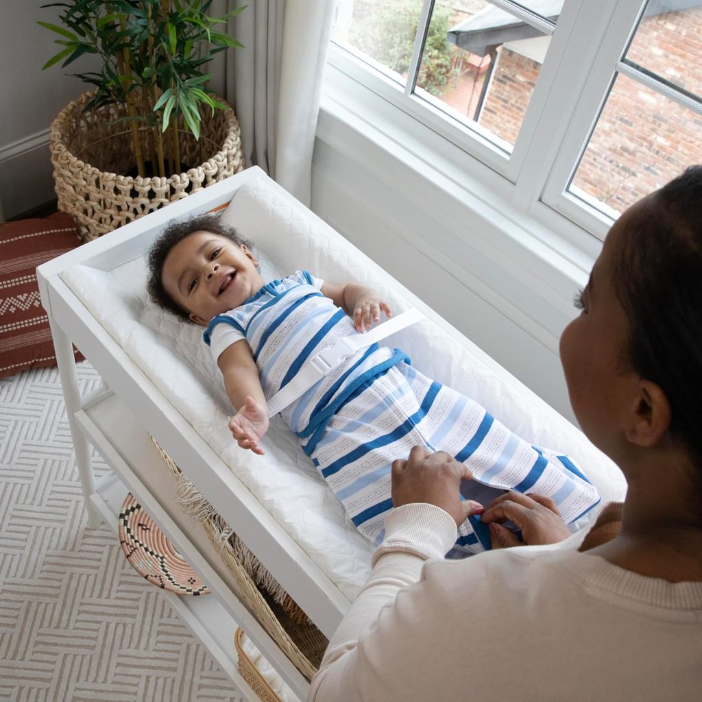 Ingenuity Contoured Changing Pad – Includes Waterproof Changing Liner and Safety Fastening Strap with Quick-Release Buckle Ingenuity Contoured Changing Pad – Includes Waterproof Changing Liner and Safety Fastening Strap with Quick-Release Buckle