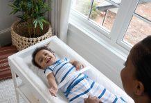 Ingenuity Contoured Changing Pad – Includes Waterproof Changing Liner and Safety Fastening Strap with Quick-Release Buckle